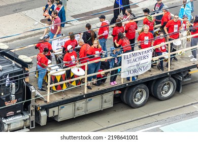 Toronto, Ontario - September 5, 2022 : The Elementary Teachers Of Toronto, Local Of The Elementary Teachers' Federation Of Ontario (ETFO), Marching In The Labour Day Parade On Queen Street 