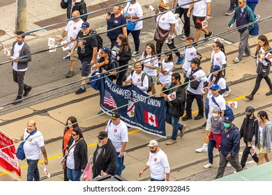 Toronto, Ontario - September 5, 2022 : ATU Transit Union Local 113 Marching In The Labour Day Parade On Queen Street West. Amalgamated Transit Union