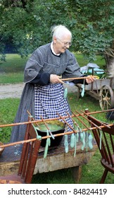 TORONTO – SEPTEMBER 17:  The Candle Maker At Annual Pioneer Festival In Black Pioneer Village  In Toronto, Canada In August 17, 2011.