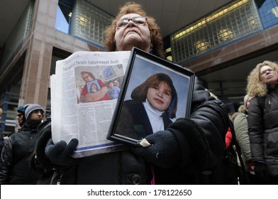 TORONTO-FEBRUARY 14: Joyce Carpenter holds a photo of her daughter Trish who was found suffocated in 1992 , during the 9th Annual Strawberry Ceremony  on  February  14 ,2014 in Toronto,Canada.