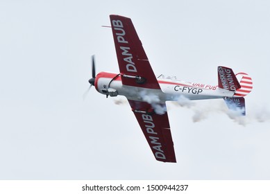 Toronto/ON, Canada – September 1, 2019: YAK 50 in an air at the 70th annual Canadian International Air Show (CIAS) over Lake Ontario