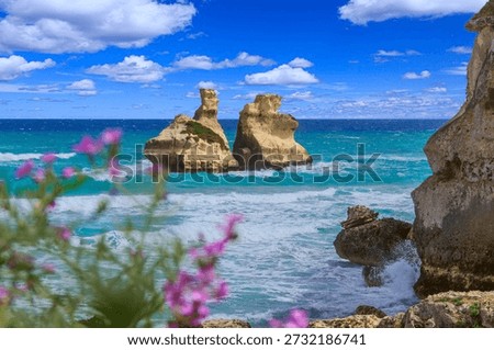 Torre dell'Orso beach with the sea stack Due Sorelle in Apulia region, southern Italy.