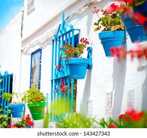 Torremolinos. Costa del Sol, Andalucia. Typical White Village with flower pots in facades at Spain