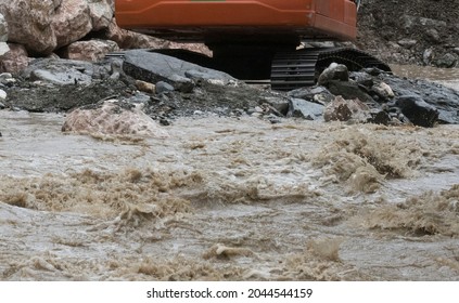 torrent control or torrent regulation with heavy machinery for flood protection