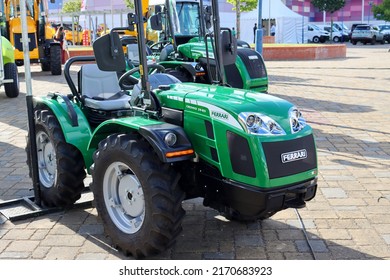 Torres Vedras, Portugal - June 2022: new italian Ferrari mini tractor at an agricultural machinery show. 