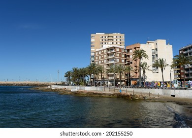 TORREVIEJA, SPAIN - MAY 6, 2012: Torrevieja is a Mediterranean city, with a privileged location and the unique climatic conditions. Is  as the ecological clean region of Europe. Embankment  in city.