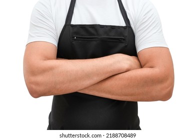 Torso Of A Man In A Black Apron With Crossed Arms Isolated On A White Background. Chef Or Waiter Concept Mockup