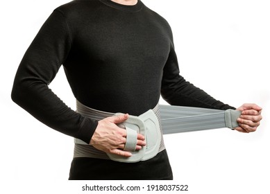 Torso Of A Man In An Orthopedic Corset On A White Background.