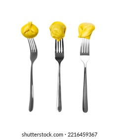 Tortellini On Forks Isolated. Agnolotti, Cappelletti, Italian Dumplings, Stuffed Pasta On Fork, Yellow Tortelloni, Handmade Ravioli, Cappelletti On Forks, Uszka On White Background