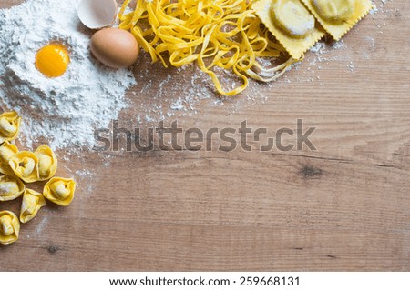 Image, Stock Photo Homemade tortelloni on a colourful wooden table