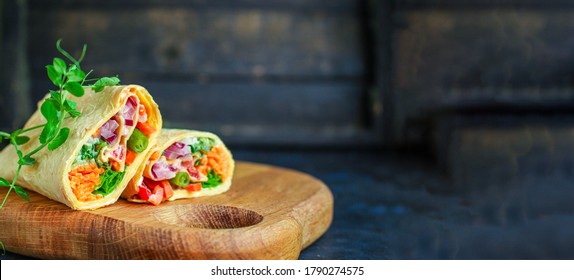 tortilla burrito wrap vegetables stuffing lavash vegetarian pita bread Menu concept Takeaway serving size fast food background top view copy space 