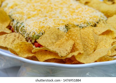 Tortilla Chips With 7 Layer Bean Dip For Outdoor Picnic Party Appetizer