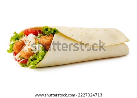 Tortilla wrap with fried chicken meat and vegetables isolated on white background, close up