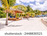 Tortola, British Virgin Islands - March 27, 2024: The beach and pier at The Bight on Norman Island
