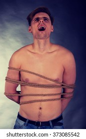 Tortured Shirtless Man Tied Rope Arkistovalokuva Shutterstock