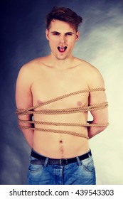 Tortured Shirtless Man Tied Rope Shutterstock