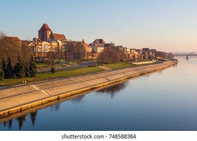 Torun city and river promenade in foggy morning. View from the Pilsudski bridge. - Powered by Shutterstock