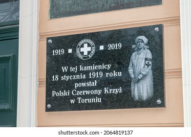 Torun, Poland - July 26, 2021: Plaque At The Site Of The Polish Red Cross In Torun.