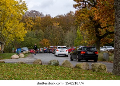 Torup, Sweden - October 20, 2019: Long Queue Of Cars Trying To Get A Spot At The Popular Parking Lot In The Forest Area Of Torup, Southern Sweden, On A Warm Autumn Day, Perfect For A Walk In The Woods