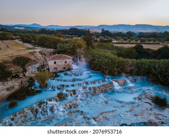 Toscane Italy August 2021, natural spa with waterfalls and hot springs at Saturnia thermal baths, Grosseto, Tuscany, Italy aerial view on the Natural thermal waterfalls at Saturnia Toscany