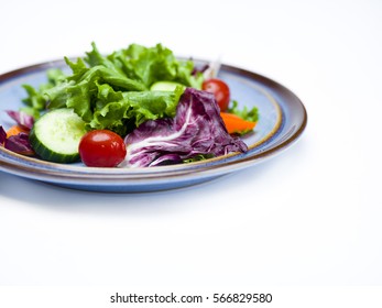 Tossed salad isolated on white background