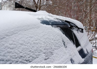 Total Cleaning Of A Minivan From Snow Fallen Last Night And Ice Formed On Windows A Bit Before Snowfall