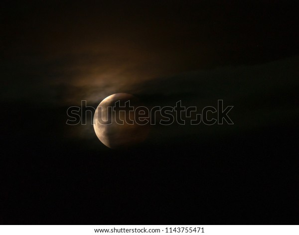 Total eclipse of the moon.\
Lunar eclipse 27. July 2018. Moon eclipse 2018. Red moon on the\
sky.