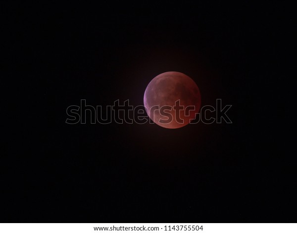Total eclipse of the moon.
Lunar eclipse 27. July 2018. Moon eclipse 2018. Red moon on the
sky.