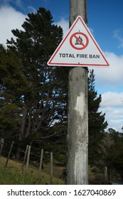 Total  Fire Ban Sign On A Wooden Pole