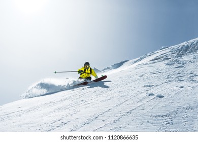 The Total Length Of Skiing On Fresh Snow Powder. Professional Skier Outside The Track On A Sunny Day