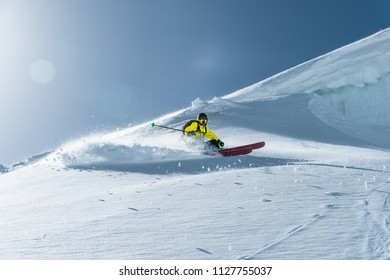 The Total Length Of Skiing On Fresh Snow Powder. Professional Skier Outside The Track On A Sunny Day