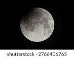 Total lunar eclipse captured on September 8, 2025, Wuhan, China, showing red blood moon against dark night sky, a spectacular astronomical phenomenon in the solar system