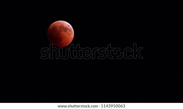 Total lunar\
eclipse, red moon of 27 July 2018. The longest total lunar eclipse\
of the entire twenty-first\
century.