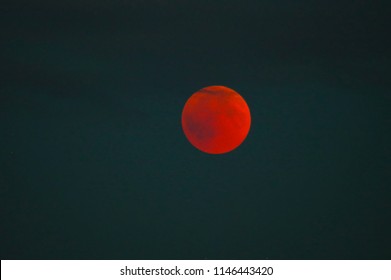 total lunar eclipse with red shining moon