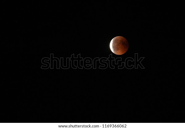 Total moon
eclipse with blood moon in close
up