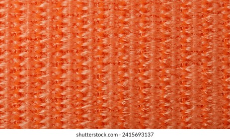 Total orange synthetic fiber texture. Braided threads fabric texture. Close up. - Powered by Shutterstock