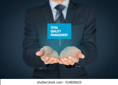 Total quality management concept. TQ manager hold virtual label with text TQM. - Shutterstock ID 514850623