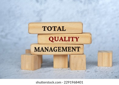 Total quality management text on wooden blocks. Business management concept. - Shutterstock ID 2291968401