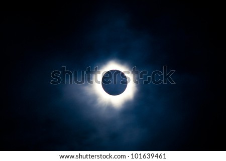 Total solar eclipse with the moon obscuring the disc of the sun so that only the corona is visible as a bright ring