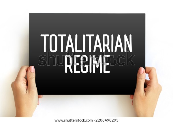 Totalitarian\
Regime - form of government and political system that prohibits all\
opposition parties, text concept on\
card