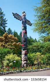 Totem Pole stands in the Butchart Gardens, Central Saanich, British-Columbia, Canada