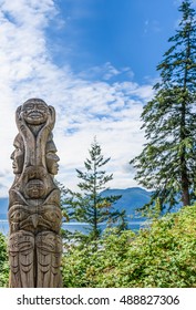 Totem wood pole in British Columbia Canada outdoor 
