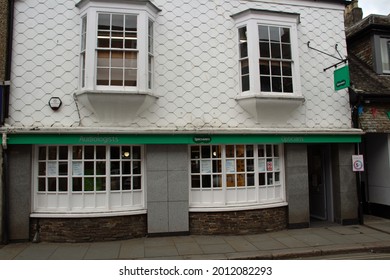 TOTNES, UK - JUNE 26, 2021 Branch Of Specsavers Optician On Fore Street On A Cloudy Day