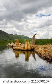 A Totora or reed boat in Laguna San Nicolas, Cajamarca, Peru. The canoes are constructed from woven reeds for fishing and as a tourist attraction in Lake Titicaca. Traditional floating raft on a lake