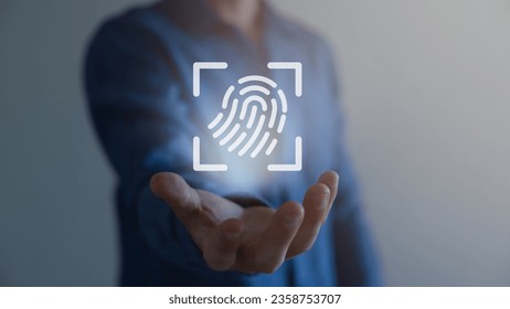 Touch screen, fingerprint scanner, biometric identity of a man's hand in a blurred background. - Shutterstock ID 2358753707