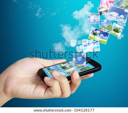 Touch screen mobile phone in hand