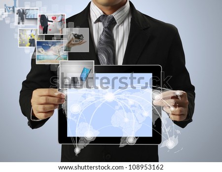 touch tablet concept images streaming from in hand
