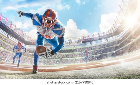 Touchdown in football. Young agile american football player running fast towards goal line. Sportsman in action. Sports emotions. Fans - Shutterstock ID 2167930843