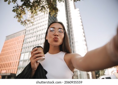 Touching Longhaired Asian Woman Squinting Her Stock Photo 2060935559 ...