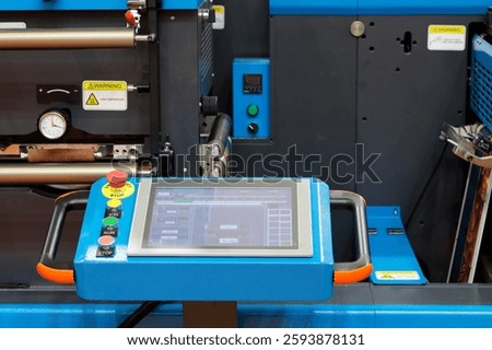 Touchscreen control panel of modern industrial equipment. Selective focus.